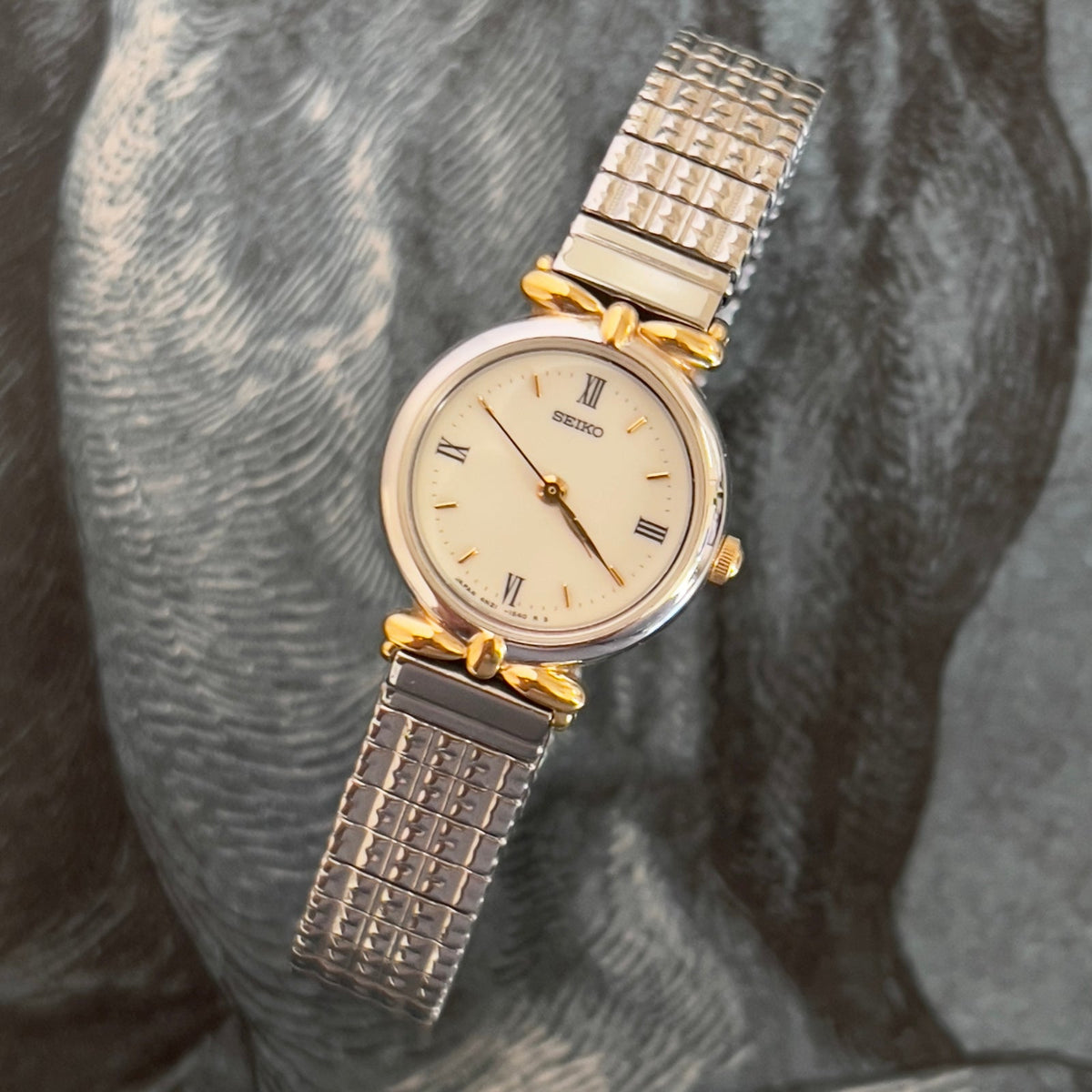 Seiko Two Toned Woman's Watch with Ribbon End Links, vintage women's watch product photo 1 of 5.