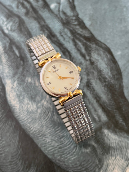 Seiko Two Toned Woman's Watch with Ribbon End Links, vintage women's watch product photo 2 of 5.