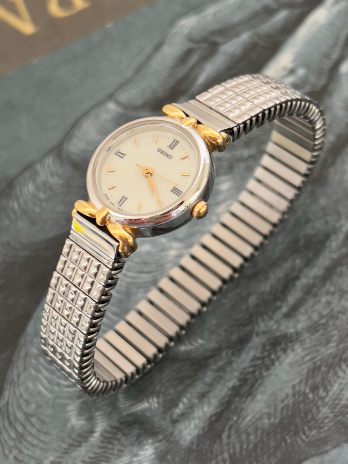 Seiko Two Toned Woman's Watch with Ribbon End Links, vintage women's watch product photo 3 of 5.