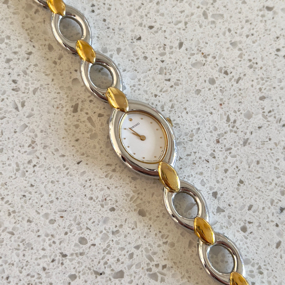 Seiko Oval Link Two Tone Women's Watch — product photograph 1, Gilded Hour NZ.