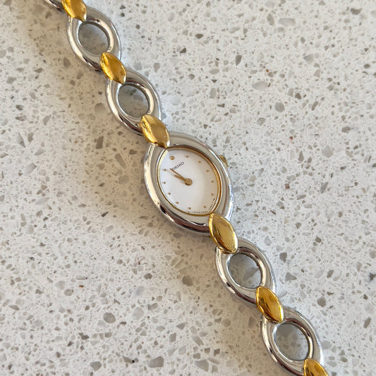 Seiko Two Toned Woman's Watch with Oval Linking Bracelet, bracelet detail of a vintage women's watch at Gilded Hour.