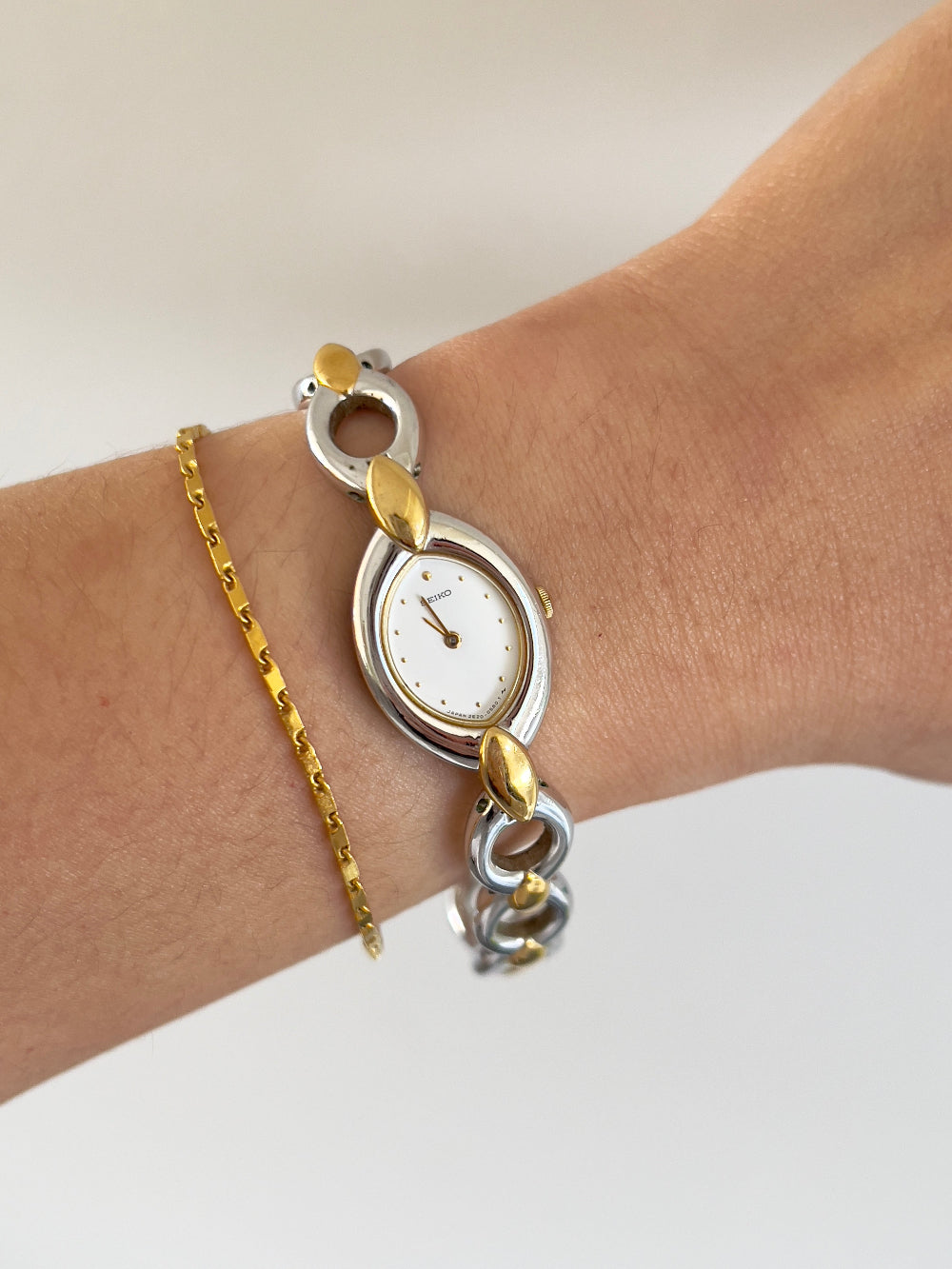 Seiko Oval Link Two Tone Women's Watch — product photograph 2, Gilded Hour NZ.
