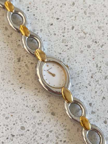 Seiko Oval Link Two Tone Women's Watch — product photograph 3, Gilded Hour NZ.