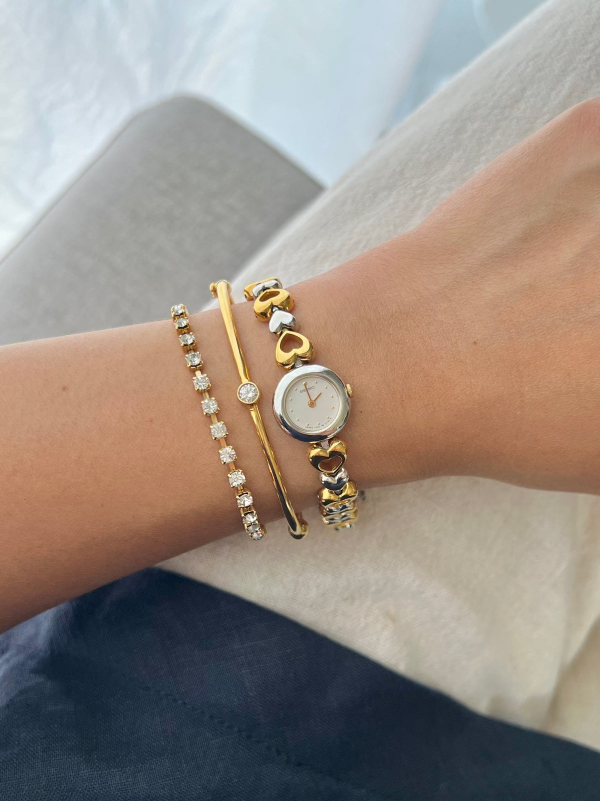 Close-up of the pearl dial on the Seiko hearts bracelet watch.
