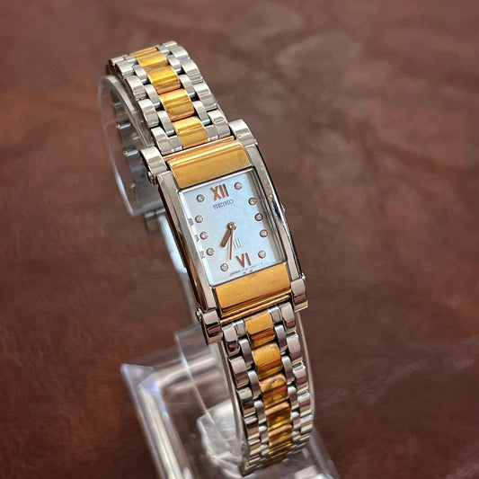Seiko Two-Tone Tank Watch with Gemstone Hour Markers featuring steel bracelet; vintage watch product image 1.
