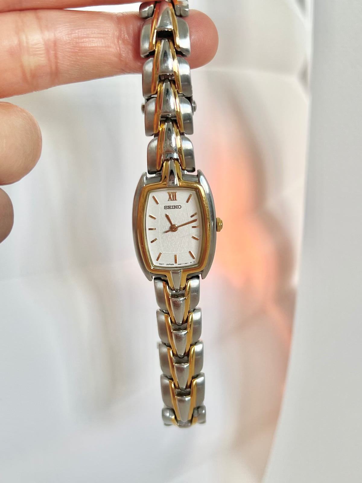 Seiko two-tone tonneau ladies watch, dial close-up.