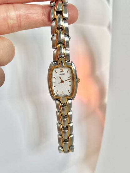 Seiko two-tone tonneau ladies watch, dial close-up.