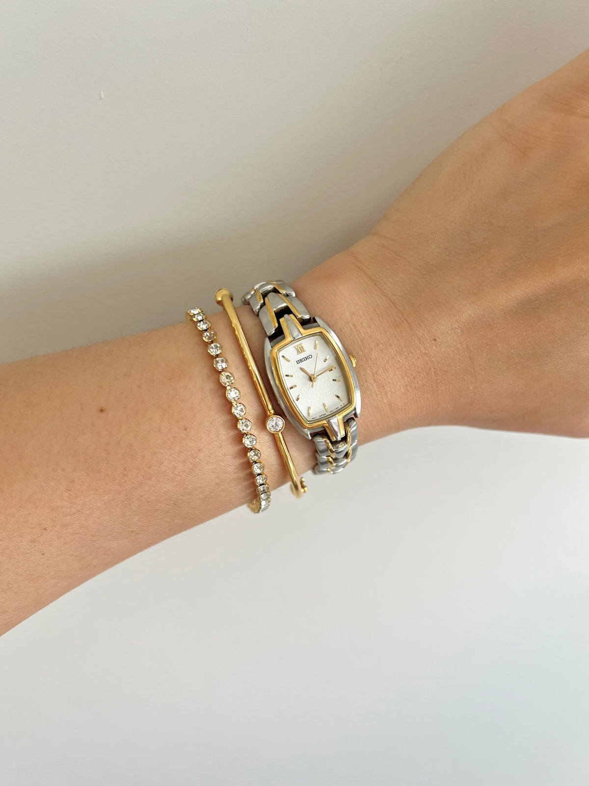 Seiko two-tone tonneau ladies watch, angle.