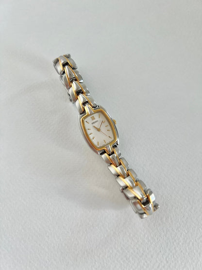 Seiko two-tone tonneau ladies watch, wrist.