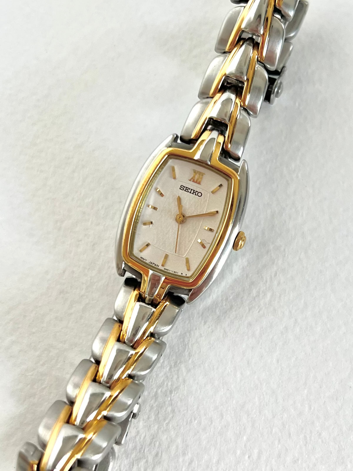 Seiko two-tone tonneau ladies watch, bracelet detail.