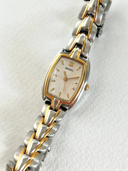 Seiko two-tone tonneau ladies watch, bracelet detail.