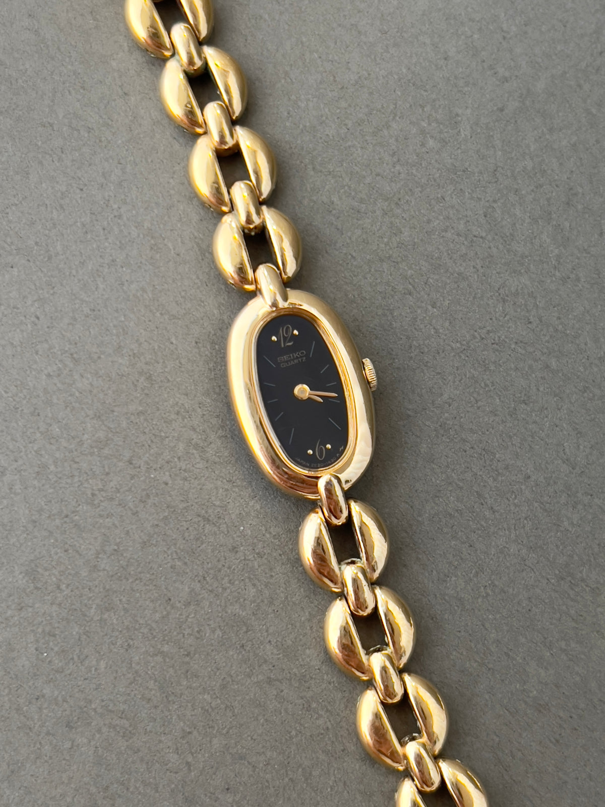 Seiko Black Dial Gold Tone Capsule Women's Watch — product photograph 3, Gilded Hour NZ.