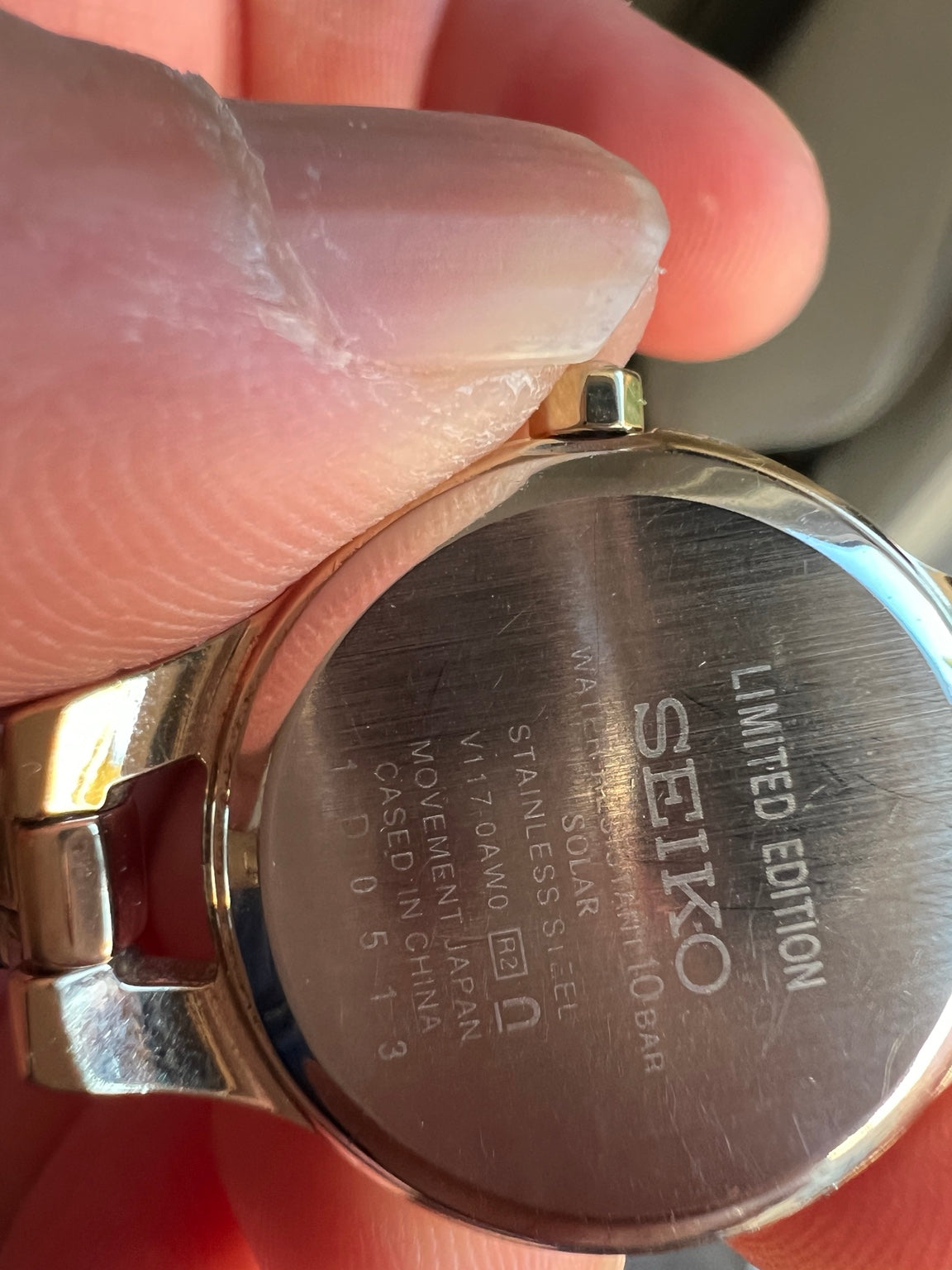 Caseback of Seiko V117 0AN0 Limited Edition solar women’s watch showing serial 1D0513 and 10 bar marking