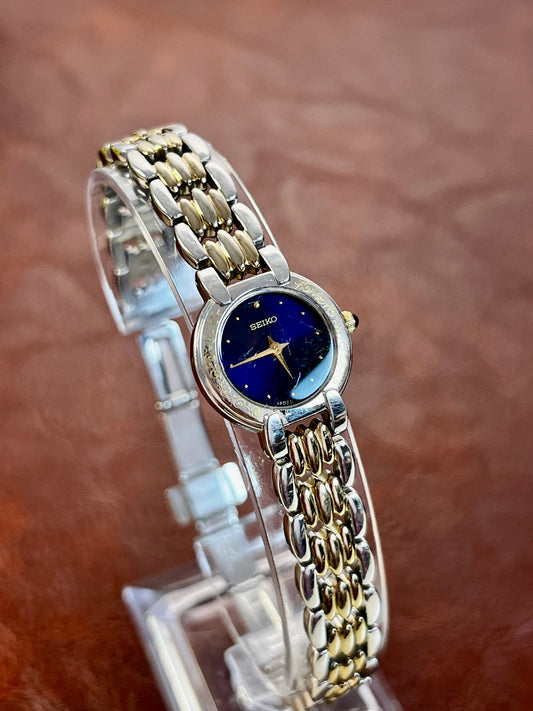 Seiko Vintage Watch with Unique Case Pattern featuring blue dial; vintage watch product image 1.