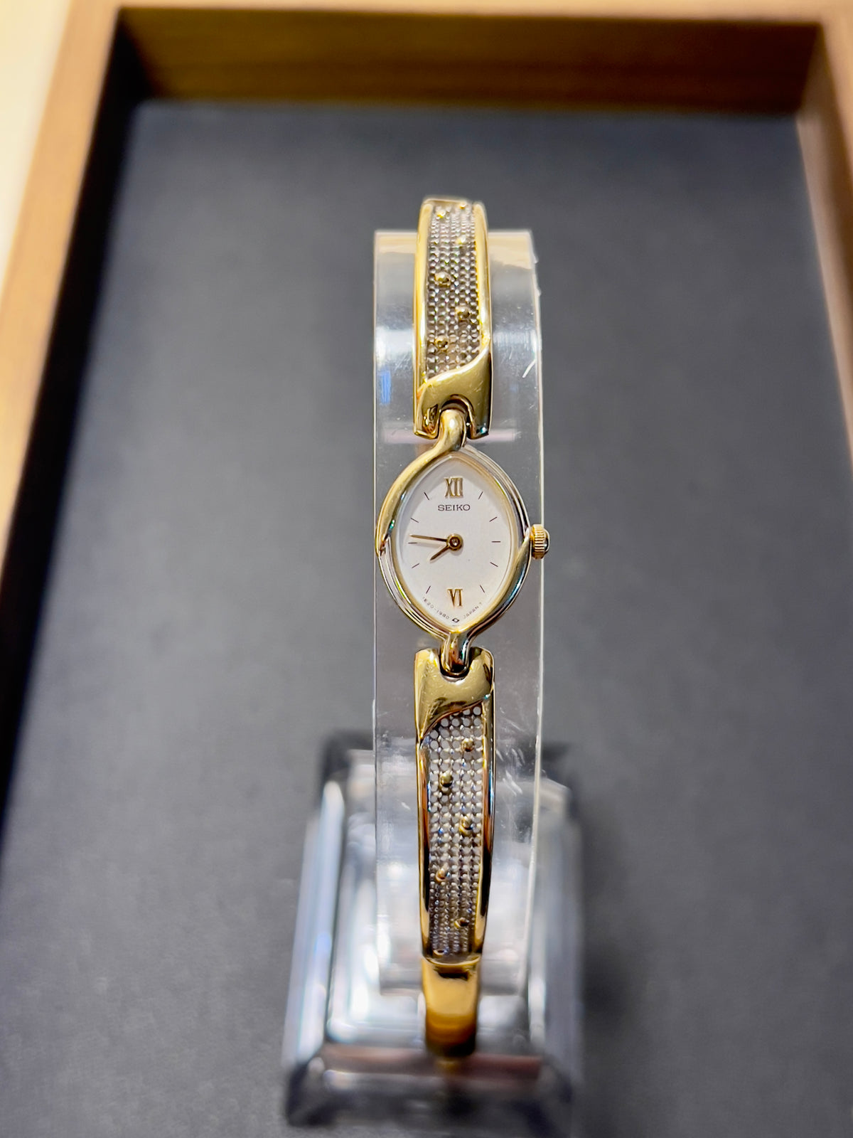 Seiko Tissé Oval Roman Dial Two Tone Bangle Women's Watch — product photograph 2