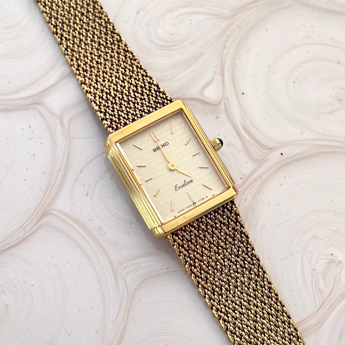 Seiko Exceline Champagne Dial Gold Tone Tank Women's Watch — product photograph 1