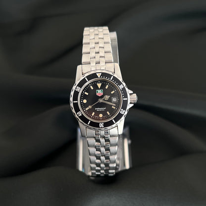 TAG Heuer 1500 Professional 200M WD1410 G 20 watch with black dial, rotating bezel, date window and stainless steel bracelet