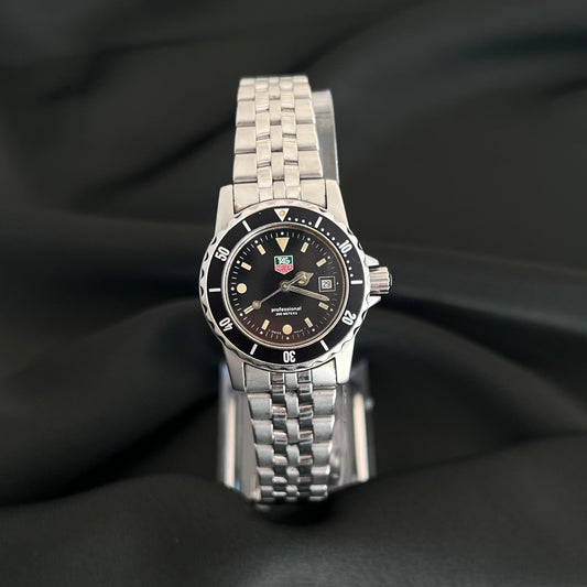 TAG Heuer 1500 Professional 200M WD1410 G 20 watch with black dial, rotating bezel, date window and stainless steel bracelet