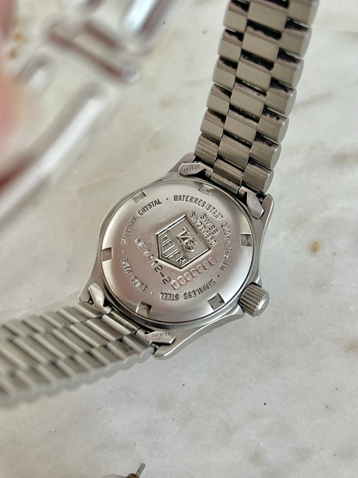 TAG Heuer 2000 Professional WE1412-2 stainless steel caseback with reference engraving