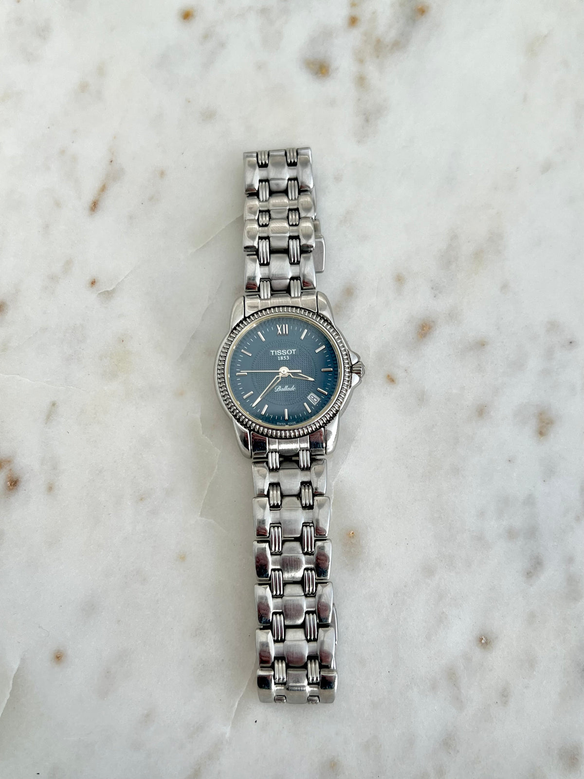 Tissot Ballade Ladies’ Watch with Navy Blue Dial, angled view of a vintage women's watch at Gilded Hour.