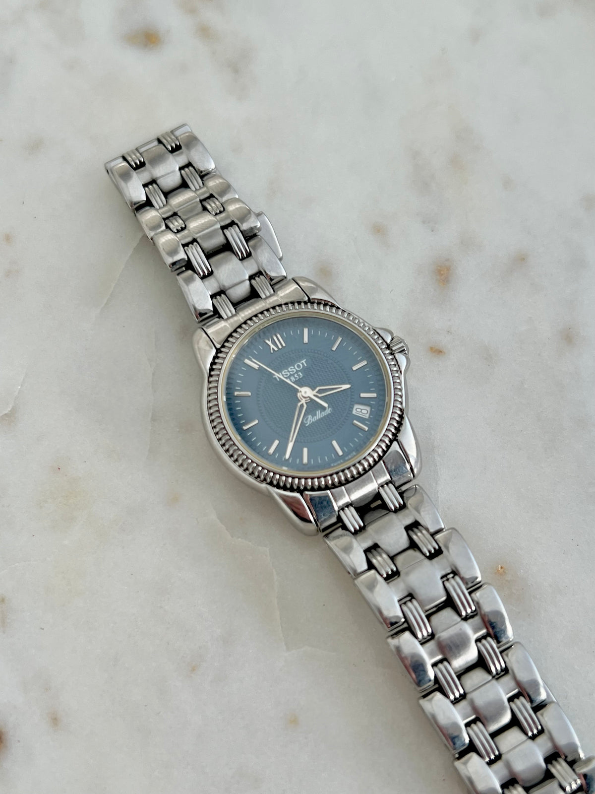 Tissot Ballade Ladies’ Watch with Navy Blue Dial, wrist shot of a vintage women's watch at Gilded Hour.