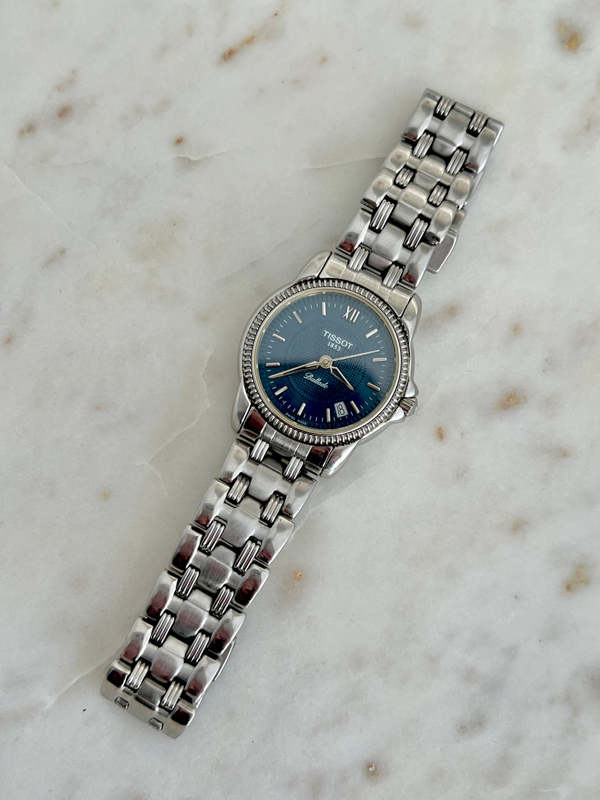 Tissot Ballade Ladies’ Watch with Navy Blue Dial, case profile of a vintage women's watch at Gilded Hour.