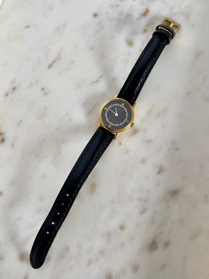 Tissot Chaîne d’Or Black Dial Chain Motif Women’s Watch; black stitched leather strap and gold tone buckle. Product photograph 4 of 10.