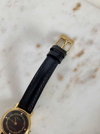 Tissot Chaîne d’Or Black Dial Chain Motif Women’s Watch; black stitched leather strap and gold tone buckle. Product photograph 6 of 10.