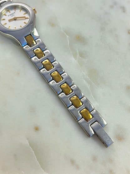 Tissot White Dial Two Tone Bracelet Women’s Watch; two tone bracelet with broad silver tone links and gold tone connectors. Product photograph 4 of 11.