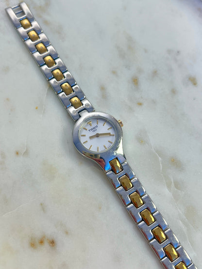 Tissot White Dial Two Tone Bracelet Women’s Watch; two tone bracelet with broad silver tone links and gold tone connectors. Product photograph 6 of 11.