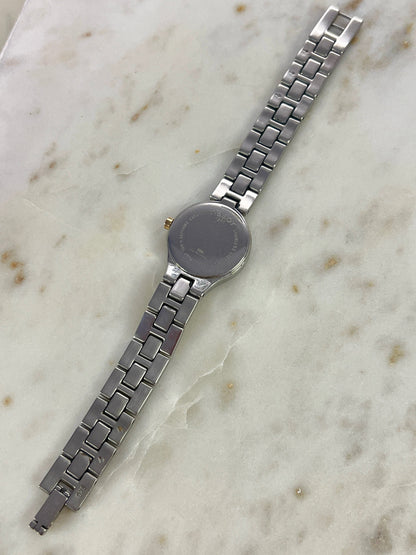 Tissot White Dial Two Tone Bracelet Women’s Watch; two tone bracelet with broad silver tone links and gold tone connectors. Product photograph 7 of 11.