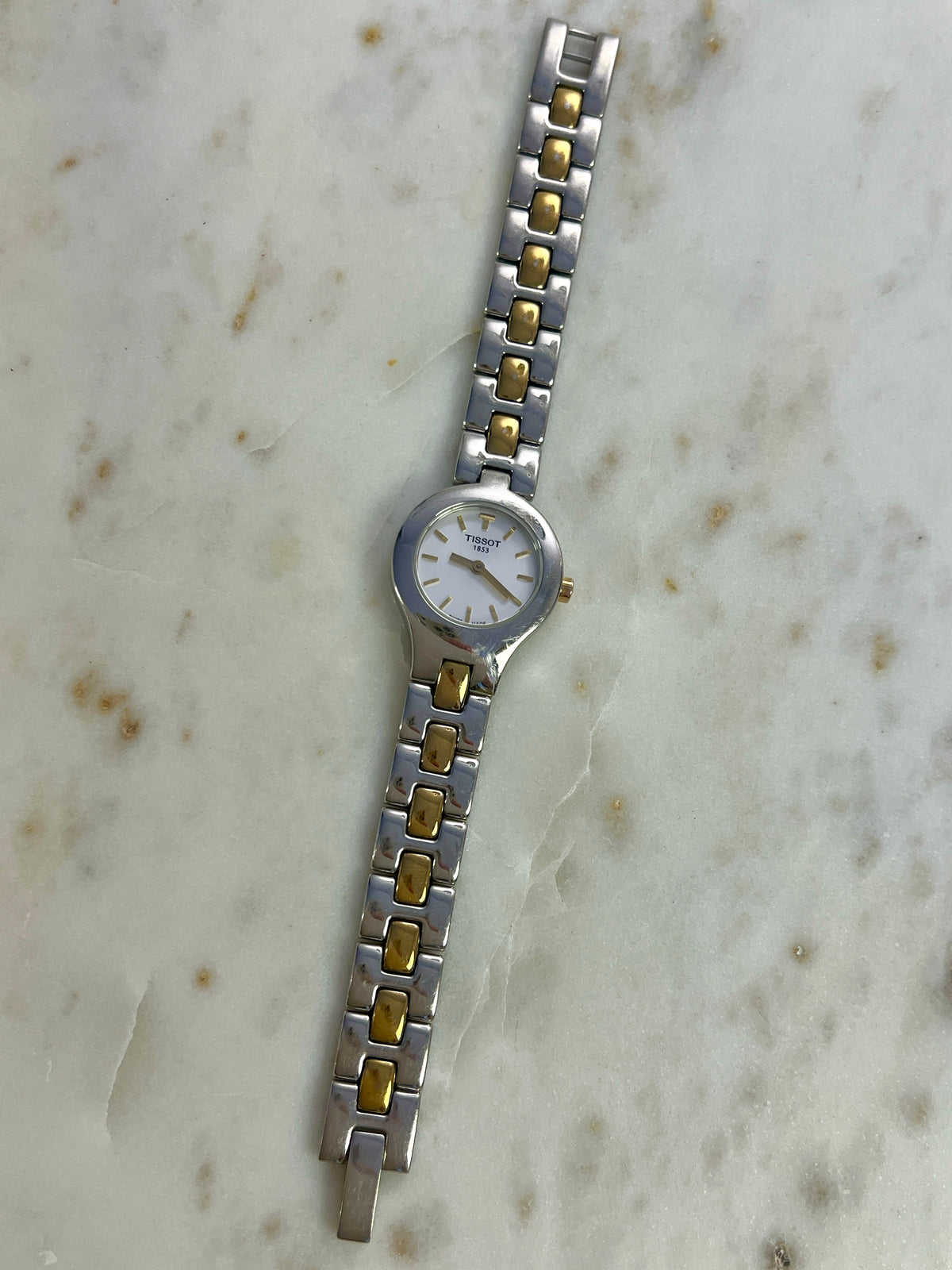 Tissot White Dial Two Tone Bracelet Women’s Watch; two tone bracelet with broad silver tone links and gold tone connectors. Product photograph 10 of 11.