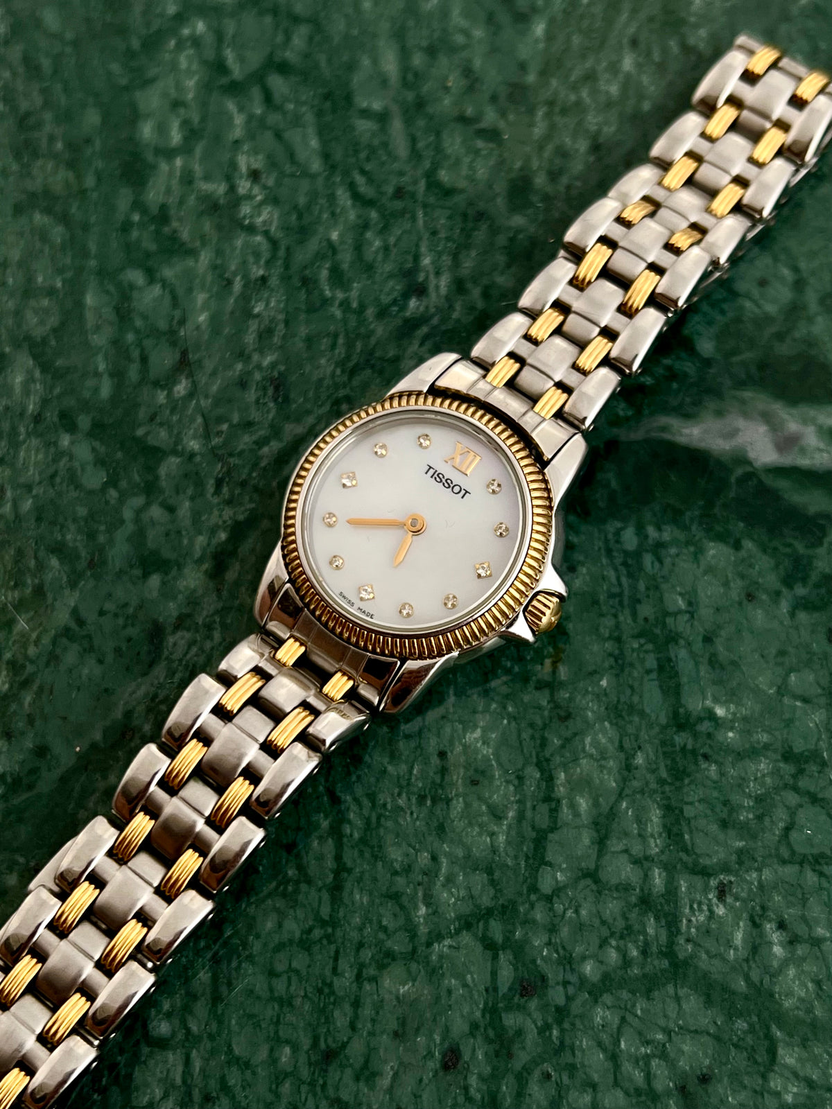 Tissot Mother of Pearl Diamond Accent watch — angled case view