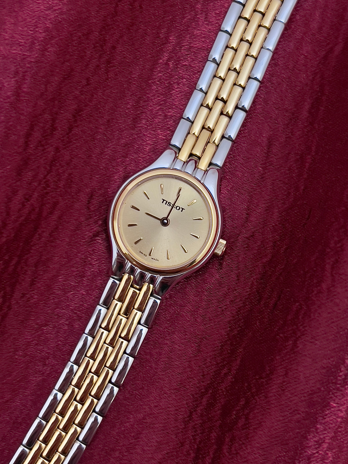 Tissot Gold Sunburst Dial Two Tone Women’s Watch, dial detail.