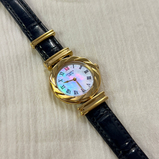 Seiko x Ungaro Rose Case Woman's Watch with Pearl Dial — the pearl dial, rose-tone case and dark blue leather strap.