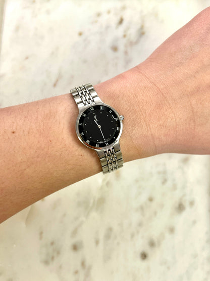 Yves Saint Laurent Black Dial Silver Bracelet Women’s Watch; silver tone bracelet with multiple rows of links. Product photograph 2 of 8.