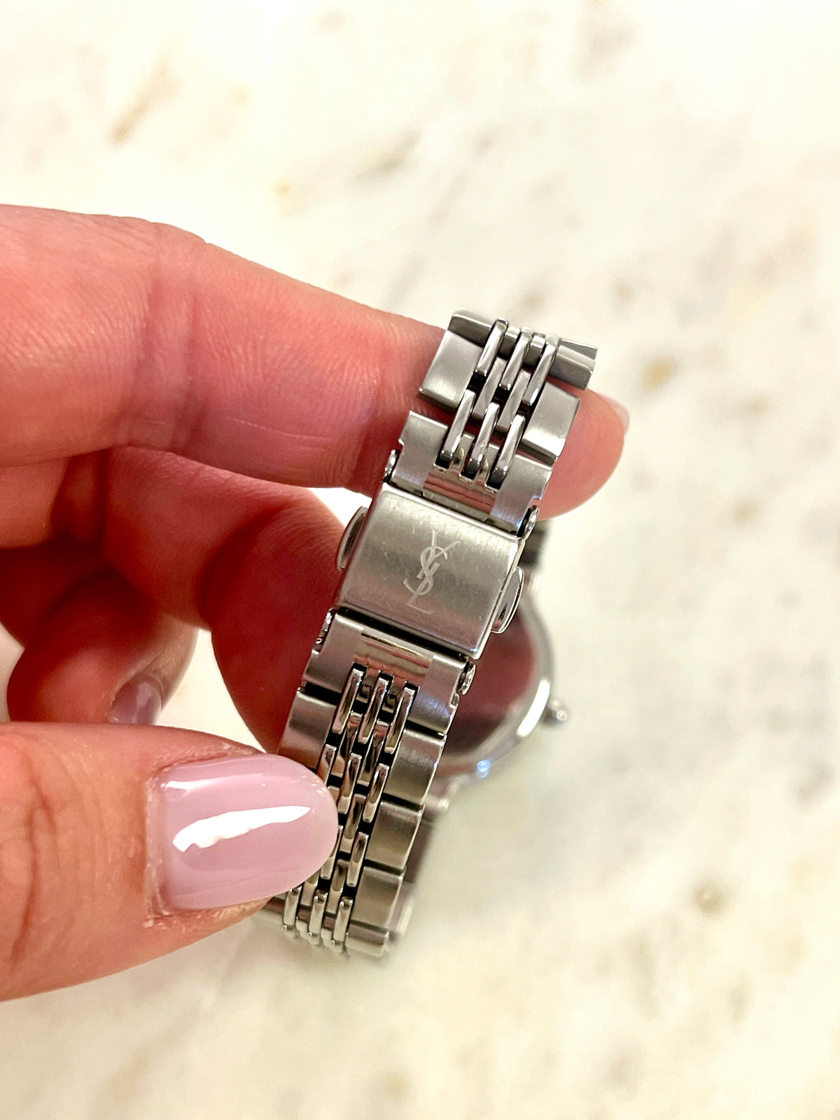 Yves Saint Laurent Black Dial Silver Bracelet Women’s Watch; silver tone bracelet with multiple rows of links. Product photograph 4 of 8.