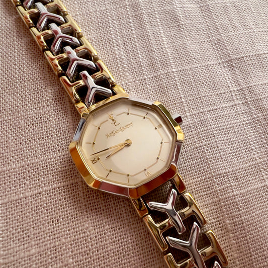 YSL Octagonal Two Toned Woman's Watch — close view of the ivory dial and octagonal two-tone case.
