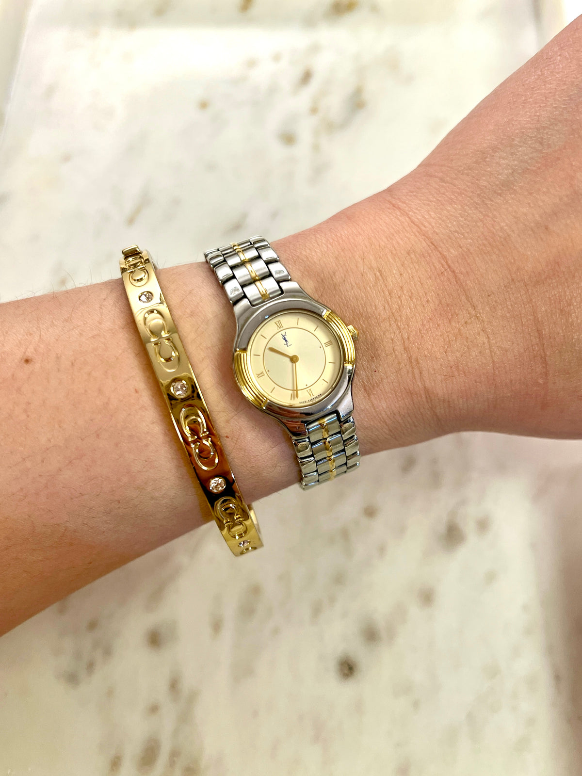 Yves Saint Laurent Gold Sunburst Dial Two Tone Women’s Watch; integrated two tone bracelet with gold tone centre details. Product photograph 2 of 10.