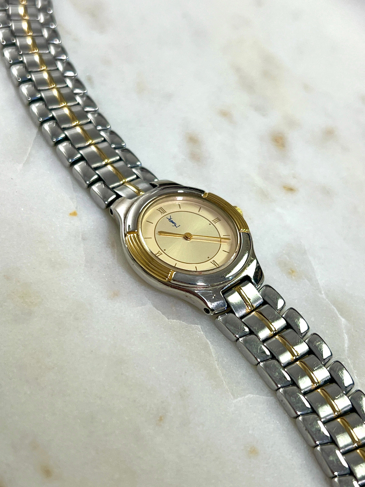 Yves Saint Laurent Gold Sunburst Dial Two Tone Women’s Watch; integrated two tone bracelet with gold tone centre details. Product photograph 4 of 10.
