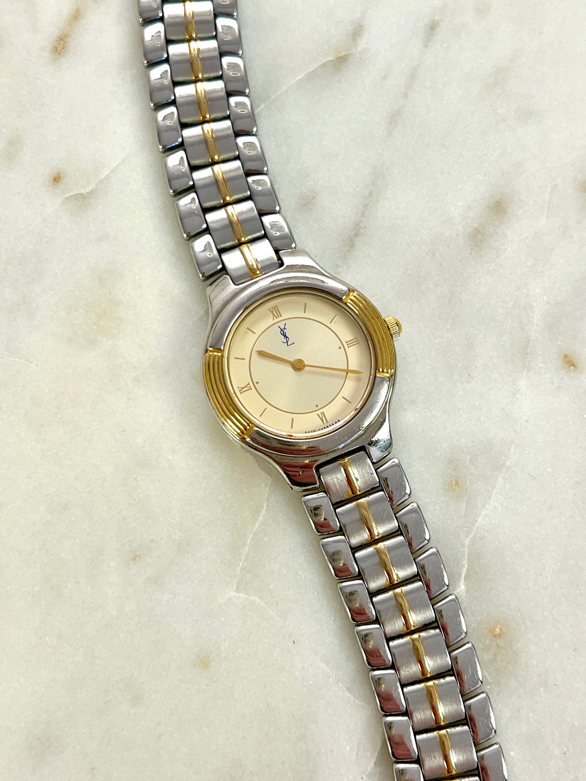 Yves Saint Laurent Gold Sunburst Dial Two Tone Women’s Watch; integrated two tone bracelet with gold tone centre details. Product photograph 7 of 10.